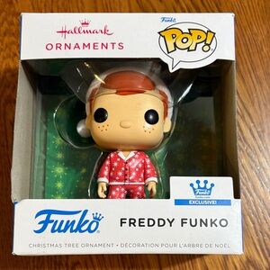 Funko Freddy Funko in Festive Red Pajamas Hallmark ornaments. New in box.